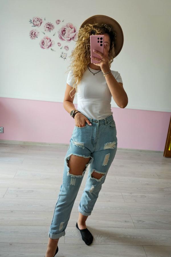 Jeansowe spodnie z dziurami 4