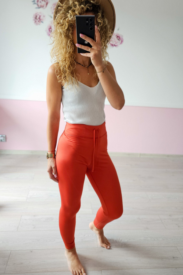 Pomarańczowe legginsy sportowe 1